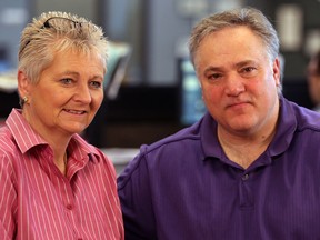 Windsor Star sports reporter Mary Caton, left,  speaks with WESPY founder Domenic Papa in The Star's newsroom Monday. (NICK BRANCACCIO/The Windsor Star)