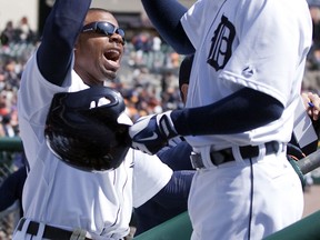 Detroit's Ian Kinsler, right, is congratulated by Rajai Davis after hitting a three-run homer against the Cleveland Indians in the fifth inning at Comerica Park. (Photo by Duane Burleson/Getty Images)