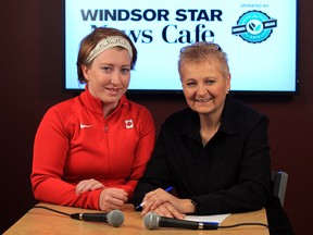 The Star's Mary Caton talks with Ontario female athlete of the year with a disability Virginia McLachlan, left, Wednesday April 16, 2014.  (NICK BRANCACCIO/The Windsor Star)