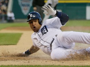 Detroit's Miguel Cabrera scores from second on a single by  J.D. Martinez during the fourth inning against the Chicago White Sox Wednesday at Comerica Park. (AP Photo/Carlos Osorio)