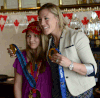 Kate Derbyshire, left, has a photo taken with Meghan Agosta-Marciano during an Olympic celebration to honour the three-time Olympic gold medallist at the Windsor Club. (JASON KRYK/The Windsor Star)