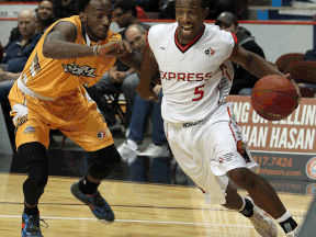 Windsor's Stefan Bonneau, right, drives to the basket against Shawn Vanzant of The Island Storm at the WFCU Centre. (NICK BRANCACCIO/The Windsor Star)