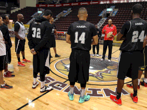 Express coach Bill Jones, centre, speaks to his team during practice at the WFCU Centre in Windsor Thursday. (TYLER BROWNBRIDGE/The Windsor Star)