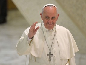 Pope Francis arrives for a meeting with blind and deaf people at Paul VI audience hall on March 29, 2014 at the Vatican.  (Andreas Solaro/AFP/Getty Images)