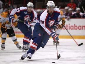 Windsor's Josh Ho-Sang brings the puck up the ice against the Sarnia Sting at the WFCU Centre. (DAX MELMER/The Windsor Star)