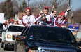 Three Amherstburg hockey teams from bantam, major, and novice parade through town celebrating Ontario championships, Sunday, April 6, 2014.  (DAX MELMER/The Windsor Star)