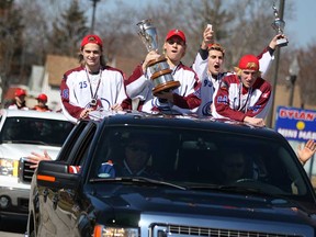 Three Amherstburg hockey teams from bantam, major, and novice parade through town celebrating Ontario championships, Sunday, April 6, 2014.  (DAX MELMER/The Windsor Star)