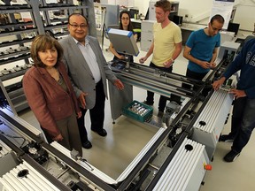 Hoda ElMaraghy (left) and Waguih ElMaraghy are seen in their lab with some students at the University of Windsor Engineering building in Windsor on Monday, April 21, 2014.                    (TYLER BROWNBRIDGE/The Windsor Star)