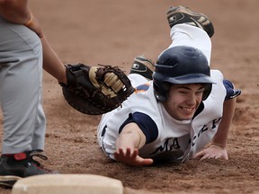 Files: Massey's Casey Boroski gets tagged out by Holy Names first baseman Andrew Jobin as the Holy Names Knights compete against the Massey Mustangs at Central Park, Wednesday, May 2, 2012.  (DAX MELMER/The Windsor Star)