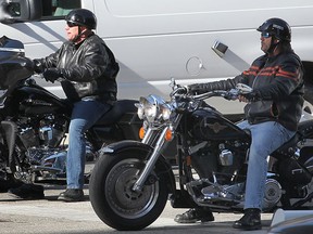 Three motorcyclists stop at a traffic light in downtown Windsor on March 31, 2014. (Dan Janisse / The Windsor Star)