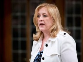 Transport Minister Lisa Raitt responds to a question during Question Period in the House of Commons Tuesday April 1, 2014 in Ottawa. (Adrian Wyld/The Canadian Press)