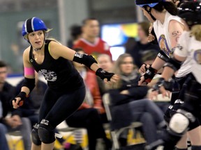 Border City Brawlers All Stars jammer and pivot Holly Hox moves with the pack in a roller derby bout against the Fergus Feims at Adie Knox Herman Arena Saturday, April 19, 2014. (JOEL BOYCE/The Windsor Star)