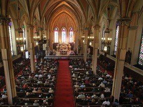 Parishioners attend Easter mass at Our Lady of the Assumption Catholic Church on Easter Sunday, April 20, 2014.  (DAX MELMER/The Windsor Star)