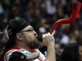 Shanon Waht cheers on the Windsor Express during Game 2 of the NBL of Canada Finals between the Express and the Island Storm at the WFCU Centre, Sunday, April 6, 2014.  (DAX MELMER/The Windsor Star)