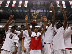 The Windsor Express celebrate after beating the Island Storm in Game 7 of the NBL championship final at the WFCU Centre in Windsor on Thursday, April 17, 2014. (TYLER BROWNBRIDGE/The Windsor Star)
