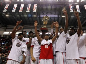 The Windsor Express celebrate after beating the Island Storm in Game 7 of the NBL championship final at the WFCU Centre in Windsor on Thursday, April 17, 2014. (TYLER BROWNBRIDGE/The Windsor Star)