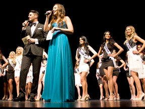 Master of Ceremonies’ Sonny Borrelli and Chelsae Durocher  stand in front of the contestants for the 2014 Miss Universe Canada Western Ontario Preliminary competition at the Capitol Theatre Saturday, April 26, 2014. (JOEL BOYCE/The Windsor Star)