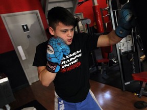 15-Year-old  fighter and wrestler Tony Laramie trains at Maximum Training Centre in Windsor on Thursday, April 17, 2014.                    (TYLER BROWNBRIDGE/The Windsor Star)