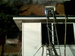 Leamington fire crews battle a house fire in the 900 block of Mersea Road 8 on April 16, 2014. (Twitter/Leamington Fire)