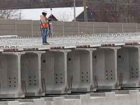 A worker surveys the girders during construction on the Herb Gray Parkway Project south of E.C. Row on April 29, 2014. (JASON KRYK/The Windsor Star)