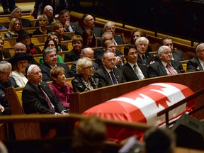 From the left (front row), Gov. General David Johnston and wife Sharon, Supreme Court Justice Beverly McLaughlin, Former PM Jean Chrétien, Liberal Leader Justin Trudeau, former PMs John Turner and Paul Martin, attend the funeral of herb Gray in Ottawa on Friday April 25, 2014. THE CANADIAN PRESS/Jonathan Hayward