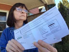 Kitty Chisholm is standing up for her neighbour who received a $3680.90 ENWIN bill.   (JASON KRYK/The Windsor Star)