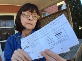 Kitty Chisholm is standing up for her neighbour who received a $3680.90 ENWIN bill.   (JASON KRYK/The Windsor Star)