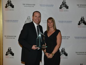 Jeff Lewis, President Liqui-Force Services (Ontario) Inc. with Andrea Seguin. Liqui-Force won the 2014 BEA Innovation Award sponsored by Union Gas Limited.