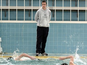 Files: Riverside High School swim team coach John Loncke keeps a watchful eye on is team as they train in the schools pool on January 24, 2005.  (Windsor Star files)