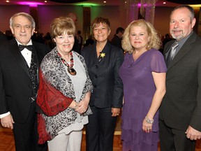 John Strasser, Gayle Strasser, Terressa Pirruza, Nancy Johns and Mike Johns (left to right) attend the 24th annual St. Clair Gourmet Wine and Food Gala at the St. Clair Centre for the Arts in Windsor on Friday, April 11, 2014.                   (TYLER BROWNBRIDGE/The Windsor Star)