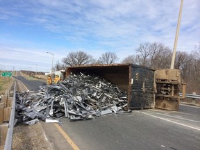 Scrap metal stretches across the on ramp to Central Avenue from EC Row on April 24, 2014. (Twitpic: DAN JANISSE/The Windsor Star)