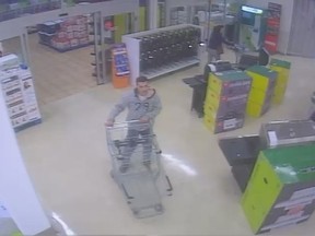 Surveillance footage of a suspected wanted in connection with a theft at the Real Canadian Superstore on Walker Road on April 5, 2014. (HANDOUT/The Windsor Star)