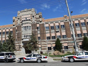 Windsor Police are shown at Walkerville Collegiate Institute on Thursday, April 24, 2014, after a lock down was issued due to a threat made on twitter.  (DAN JANISSE/The Windsor Star)