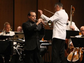 Trumpeter Gary Guthman joins conductor Robert Franz and the rest of the WSO for the regular Pops performance at the Capitol Theatre in Windsor on Friday, April 11, 2014.                   (TYLER BROWNBRIDGE/The Windsor Star)