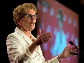 Ontario Premier Kathleen Wynne speaks to The Empire Club of Canada in Toronto on Monday, April 28, 2014. (Frank Gunn/The Canadian Press)