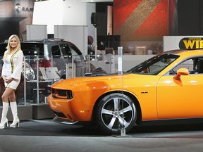 Chrysler announced Monday it will unveil the new 2015 Dodge Challenger and Dodge Charger on April 17 at the New York Auto Show. The limited edition Dodge Challenger Shaker, above, is shown during January's North American International Auto Show in Detroit. (Scott Olson / Getty Images)