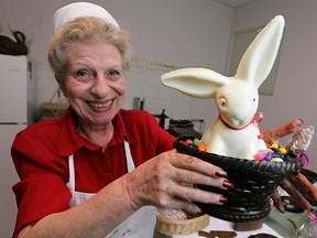 Josephine Obeid, co-owner of Walkers Candies, shows a handcrafted white-chocolate Easter Buny made in-store. (Dax Melmer/The Windsor Star)