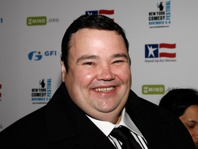 In this November 2008 file photo, John Pinette arrives to the second annual Stand Up For Heroes: A Benefit for the Bob Woodruff Foundation in New York. Pinette, the stand-up comedian who portrayed a hapless carjacking victim in the final episode of Seinfeld, has died. He was 50. Pinette died of natural causes Saturday, April 5, 2014, at a hotel in Pittsburgh, the Allegheny County Medical Examiner's office said Sunday evening. Pinette's agent confirmed his death. (Stuart Ramson / Associated Press files)