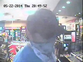 A security camera image of a male who robbed the Mac's Convenience Store at 991 Ouelllette Ave. on May 22, 2014. (Handout / The Windsor Star)