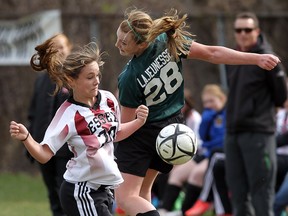 Essex's Elizabeth Stiers, left, collides with Lajeunesse's Simard Morgan last month. (TYLER BROWNBRIDGE/The Windsor Star)