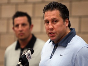 Spits GM Warren Rychel, right, answers questions at the WFCU Centre. (TYLER BROWNBRIDGE/The Windsor Star)