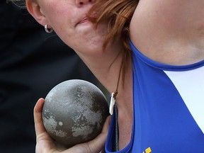 St. Anne's Maddy Mooney throws the shot putt at the WECSSAA track and field championships at Sandwich Thursday. (DAN JANISSE/The Windsor Star)