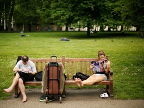 LONDON, ENGLAND - JUNE 19:  Members of the public enjoy the hot weather in St James Park on June 19, 2013 in London, England. Whilst the country is currently experiencing high temperatures, there has been a prediction by senior meteorologists that Britain may be expecting up to 10 years of rainy summers due to warming of the North Atlantic waters.  (Photo by Matthew Lloyd/Getty Images)