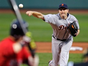 Tigers starting pitcher Max Scherzer, right, delivers a pitch in the first inning against the Red Sox at Fenway Park. (AP Photo/Charles Krupa)