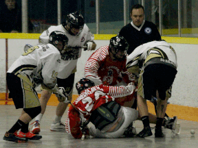 Windsor and St. Catharines players battle for the lacrosse ball during junior B action at Forest Glade Arena Saturday. (RICK DAWES/The Windsor Star)