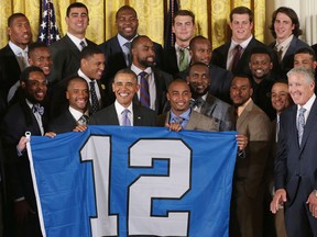 LaSalle's Luke Willson, back row, second from right, joins his Seahawk teammates as U.S. President Barack Obama, centre, poses for photographs with the players, coaches and executives of the Super Bowl XLVIII champion Seattle Seahawks and their coach Pete Carroll in the East Room of the White House on Wednesday in Washington, D.C. Obama honored the Seahawks and their 43-8 win over the Denver Broncos last February. (Chip Somodevilla / Getty Images)