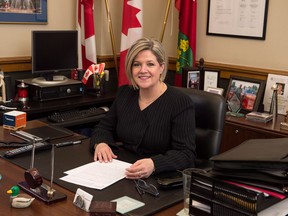 Ontario NDP leader Andrea Horwath poses for a photo at her legislature office in Toronto on Friday May 2, 2014. The stage has been set for a June election in Ontario after Horwath announced she has lost confidence in Premier Kathleen Wynne and the province's minority Liberal government. THE CANADIAN PRESS/Frank Gunn