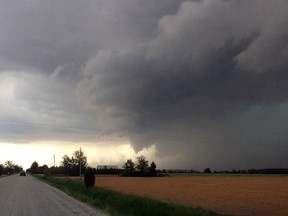 A brilliant display of an approaching thunderstorm is seen near Puce Road in Lakeshore, Ontario on May 27, 2014. (JASON KRYK/The Windsor Star)