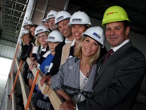 Lakeshore MURF partners, from right to left, Barry Zekelman, Stephanie Zekelman, Danielle Tullio, Rocco Tullio and family members stand above the newly named Rock Developments arena, May 15. Rock Developments president Rocco Tullio donated $300,000 to the project, taking naming rights for the 1,000 seat arena. (Rick Dawes/The Windsor Star)