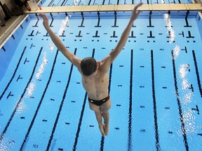 Vincent Riendeau of Montreal dives off the 10 metre tower on Tuesday, May 27, 2014, at the Windsor Aquatic Centre during warm ups for the FINA/NVC World Diving Series. (DAN JANISSE/The Windsor Star)